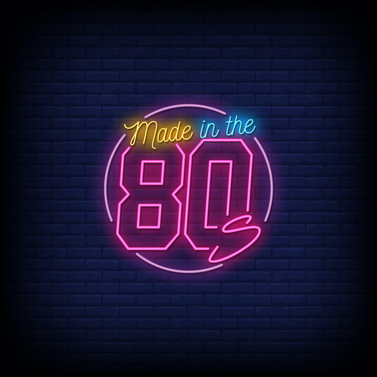 80s Music Quiz Questions and Answers cover photo of a round neon sign with the words 'Made in the 80s'