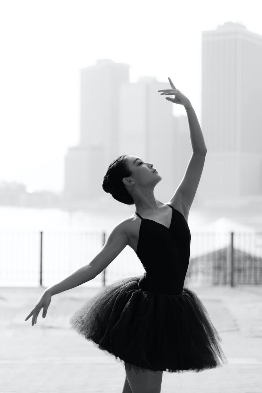Ballerina in a black leotard and black tutu
