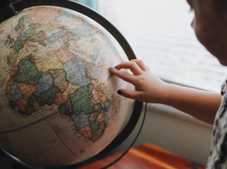 Country Anagrams with Answers Cover Photo of a child pointing to countries on a globe