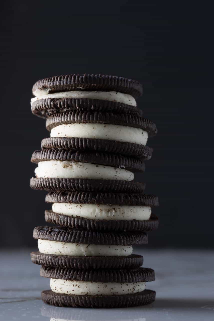 Black and white oreo biscuits stacked on top of each other