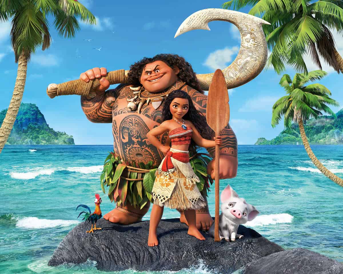 Moana Quiz Questions and Answers cover photo of Moana and Maui standing on a rock with palm trees either side, pua the pig and heihei the rooster stood either side of them