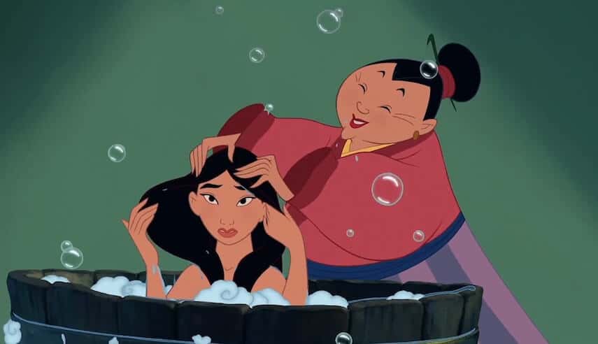 Mulan being washed in a wooden tub
