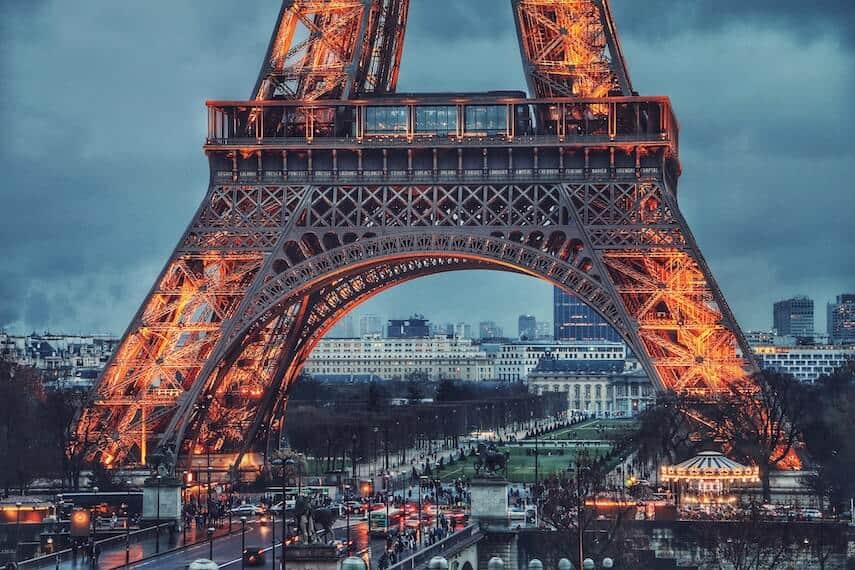 Close up of Eiffel Tower lit up at night