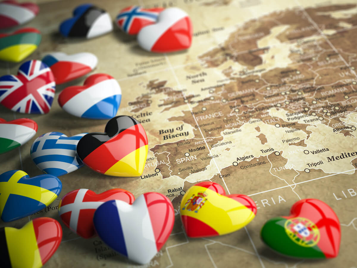 European Cities Quiz cover photo of a sepia coloured Europe map with ceramic hearts with different European countries flags on each