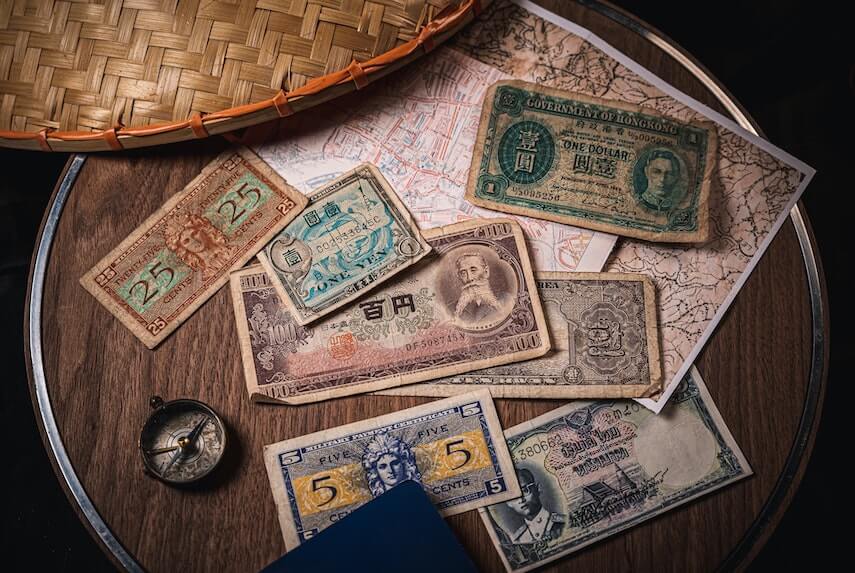 Mix of old bank notes from thailand, camodia, hong kong and japan