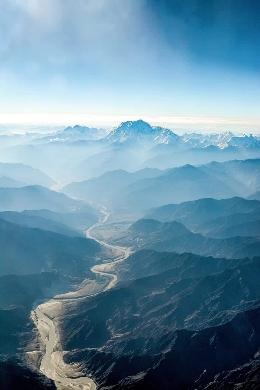 Mountains with river winding through the base, taken from the air