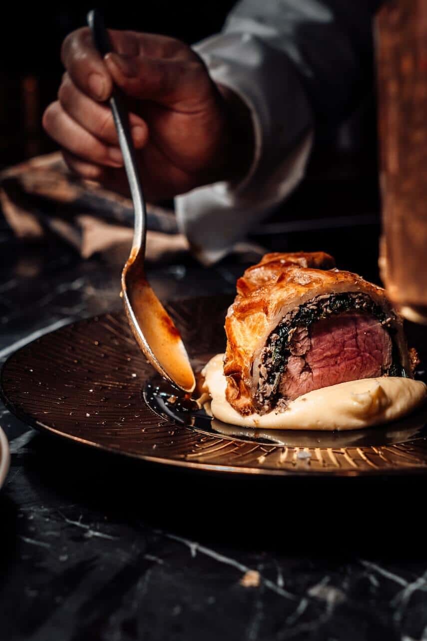 Slice of Beef Wellington on a plate