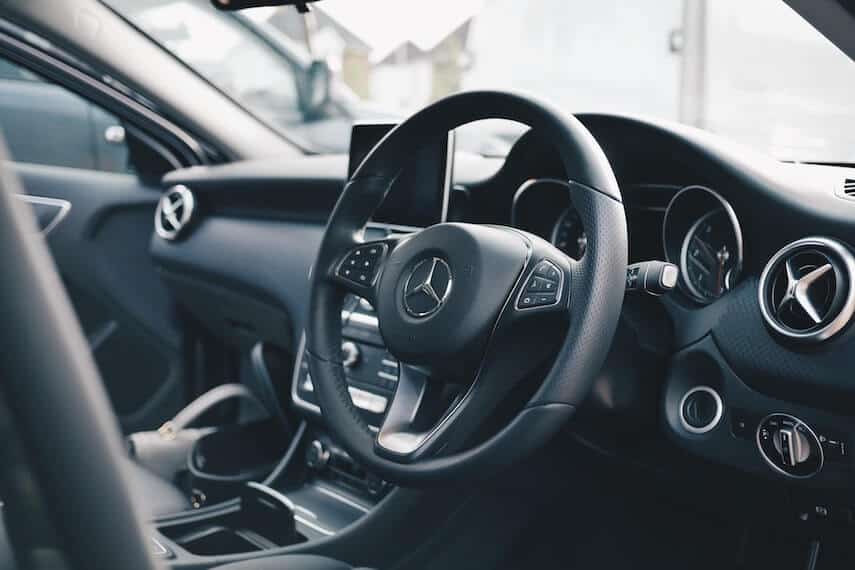 Inside wheel and dashboard of a Mercedes car