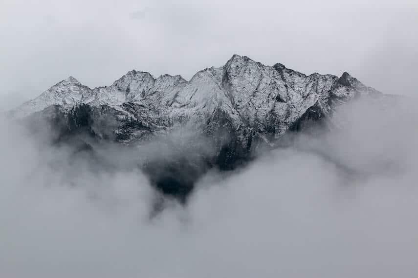 Mountain peaks surrounded by low clouds