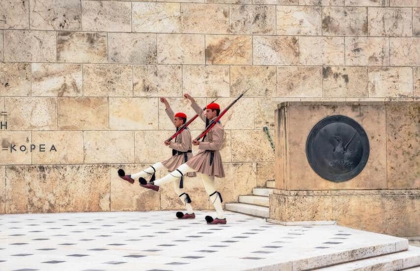 Two men performing changing of the Guard ceremony in Athens